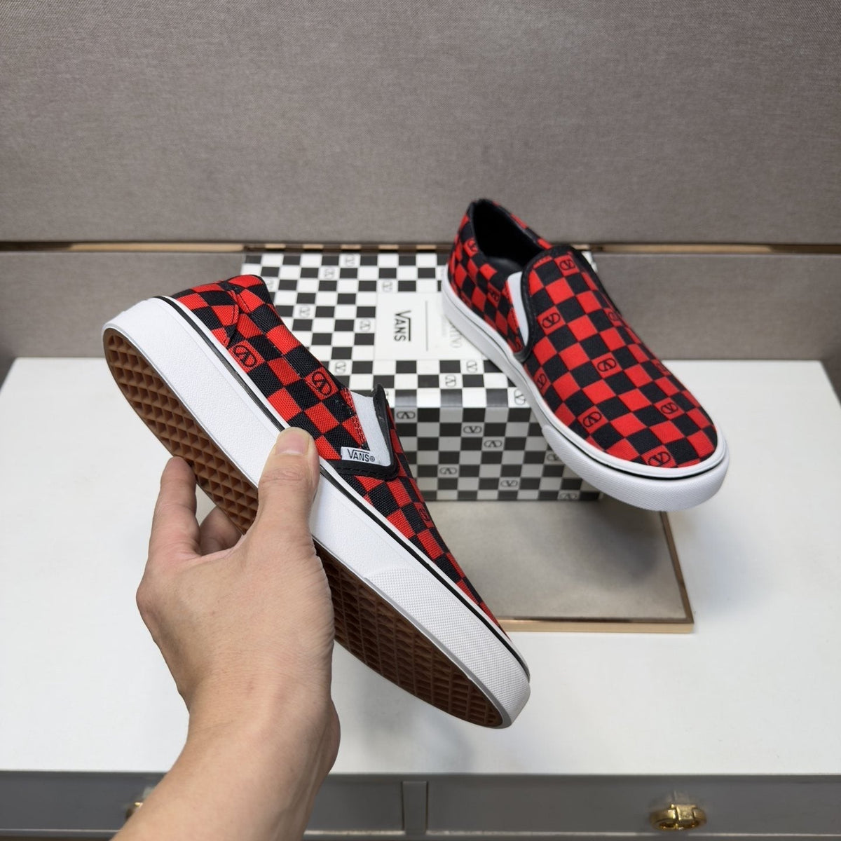 Vans Red and Black Checkerboard Slip-On Sneakers