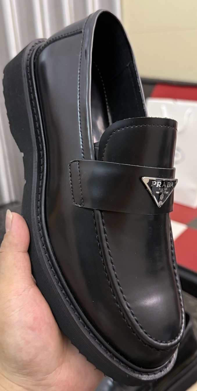 Prada Triangle Plaque Loafers